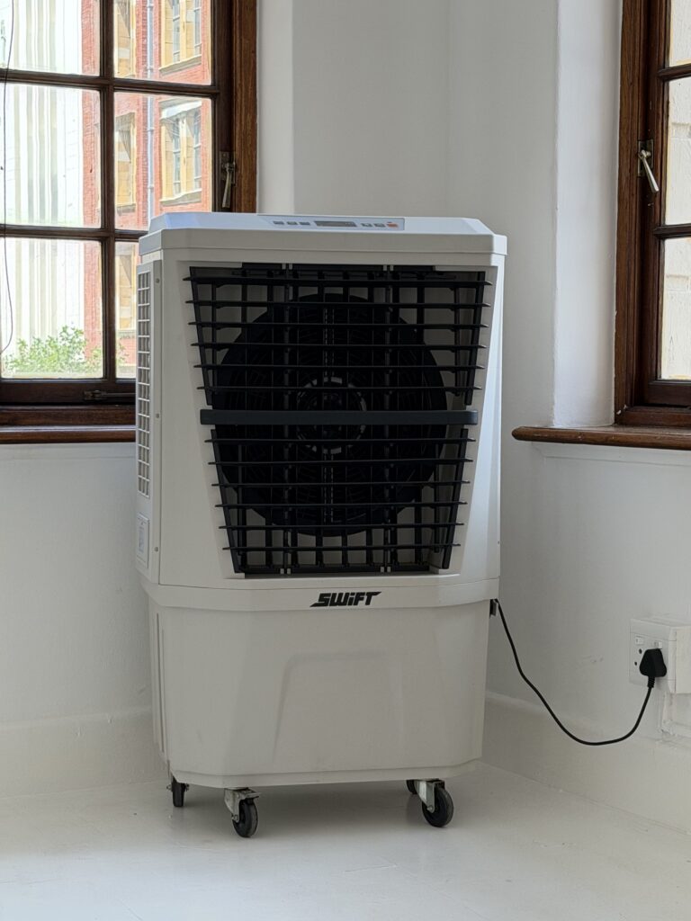Portable evaporative air coolers used for food art exhibition