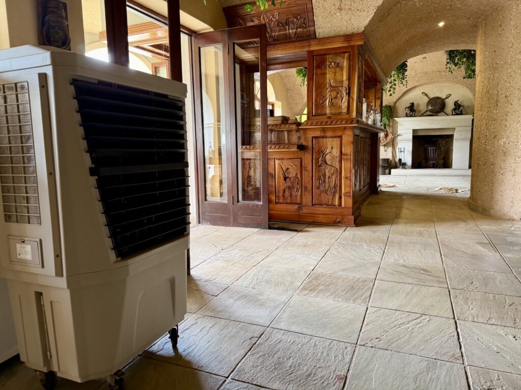 Evaporative air cooler used in indoor bar and lounge area