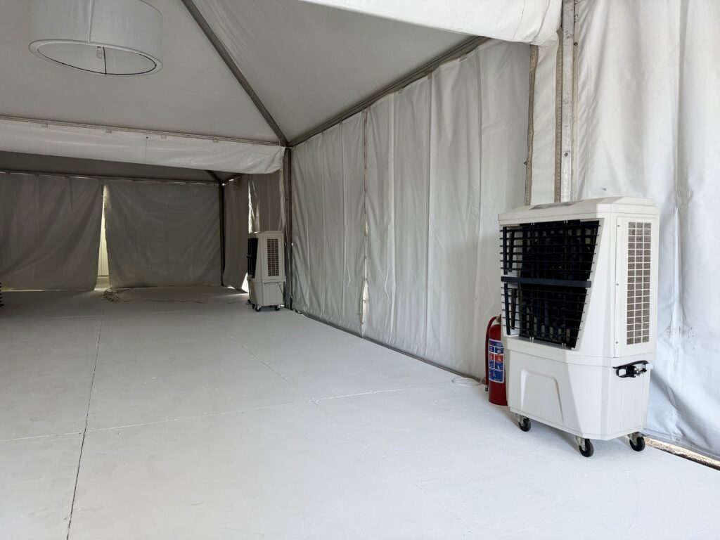 Evaporative air coolers inside Snowpeak tent at private home event