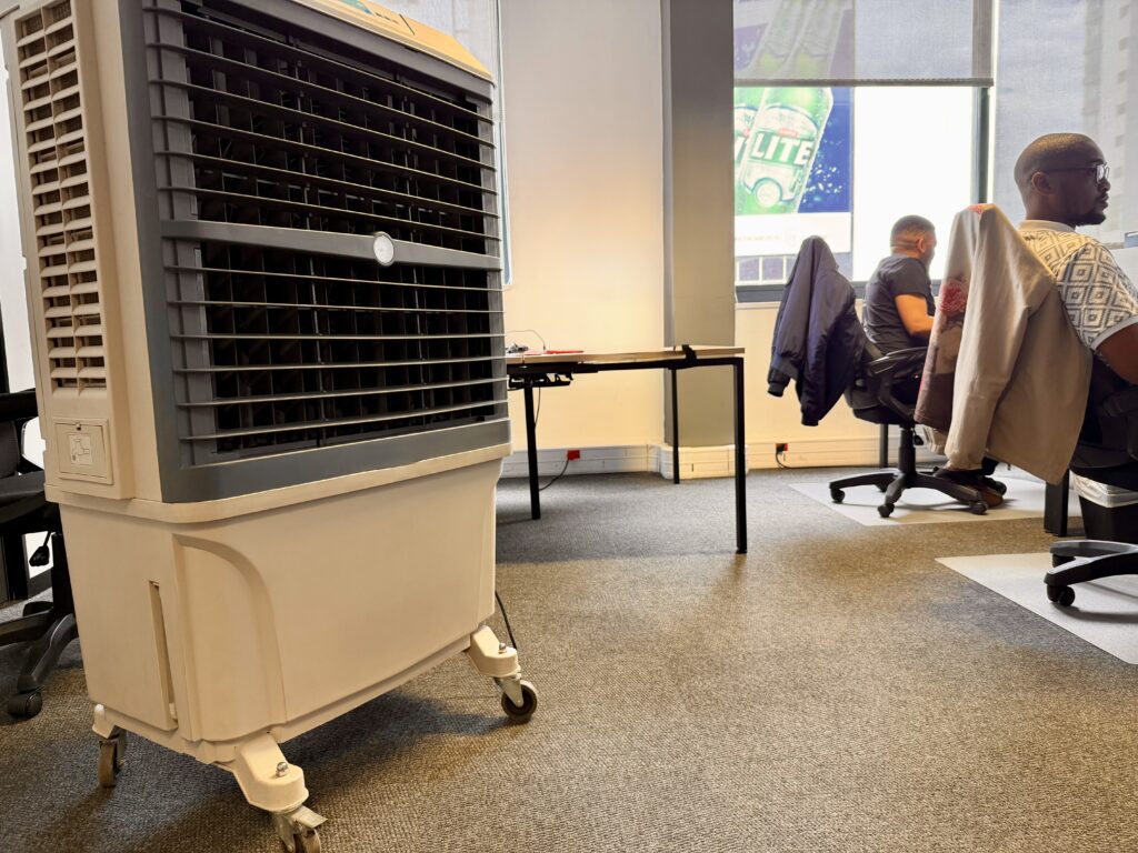 Large-size evaporative air cooler supporting high-occupancy workspace