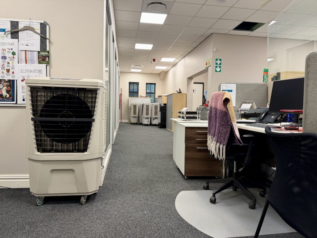 Multiple evaporative air coolers used across office environment